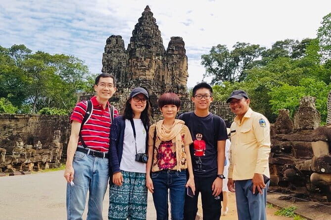 A Day Tour to Magnificent Angkor - Stop 3: Angkor Thom at 14:00 for the Face-Tower World