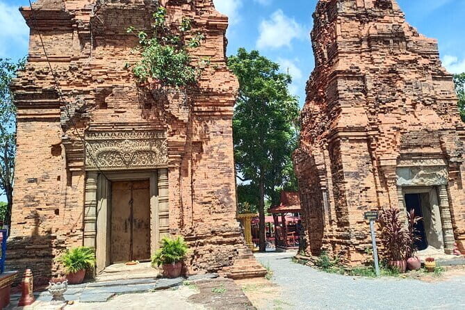 A Day Trip to Angkor Wat, Bayon, Taprohm from Phnom Penh - Bayon in Angkor Thom: the Buddha faces and the carvings that catch your eye