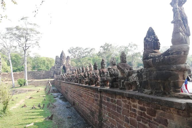 Afternoon Angkor Wat Private Tour with Sunset - Stop 2: Ta Prohm, the Tomb Raider-style ruins that feel more human