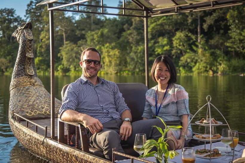 Angkor Bike tour & Gondola Sunset Boat - Cycling toward a rare view behind Angkor Wat