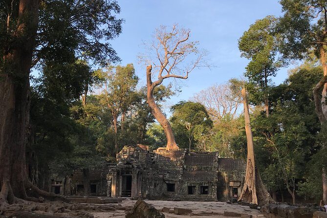 Angkor Jeep Tour with Sunset & Sunrise - Day 2 begins in darkness: sunrise calm at Angkor Wat