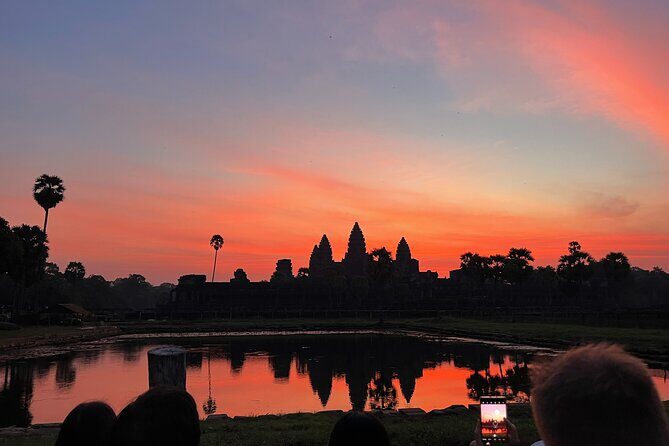 Angkor Sunrise Bike Tour with Lunch Included - Angkor Wat at sunrise: ponds, reflections, and the ticket rhythm