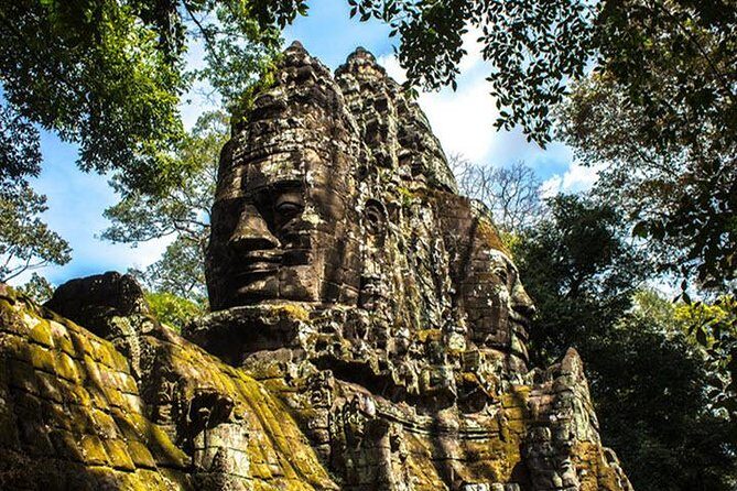 Angkor Wat highlight Tour From Sunrise -Small Group - Bayon Temple: the central towers up close