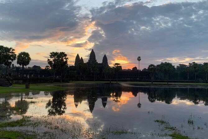 Angkor Wat Sunrise and Tonle Sap Cruise Sunset Tour - Angkor Thom in One Hour: South Gate, Bayon, and the Terrace Stops