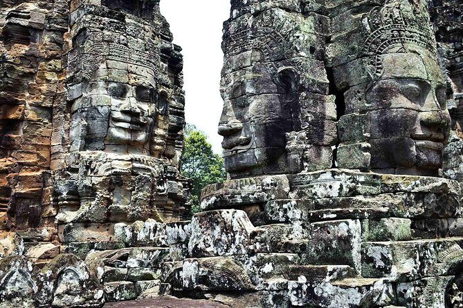 Angkor Wat Sunrise or Sunset Tour with Guide from Siem Reap - South Gate of Angkor Thom, Bayon, and Baphuon: faces, towers, and context