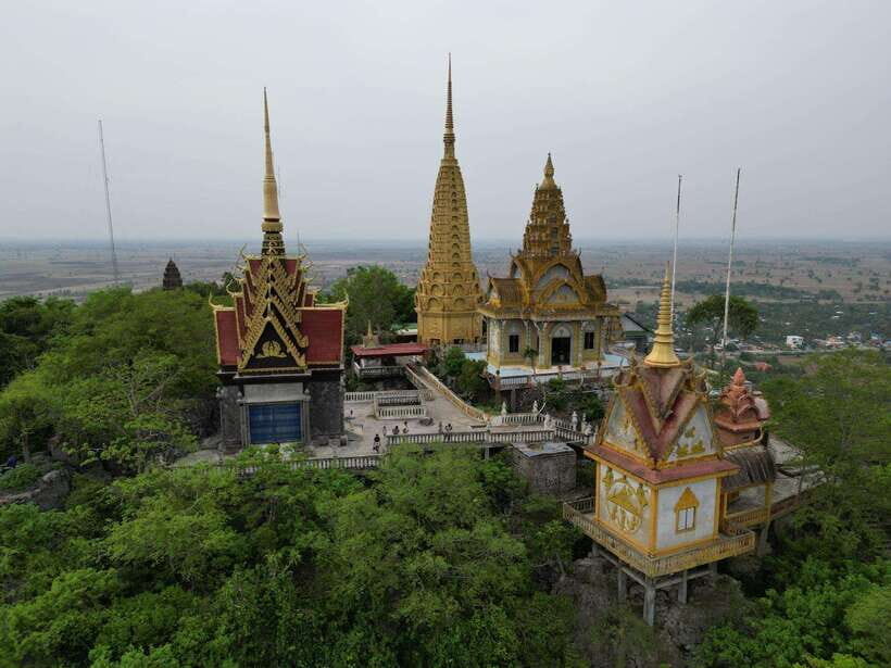 Bamboo train. Phnom Sampove cave. Bat cave and Banan Temple - Kampongpil suspension bridge and village life in the countryside