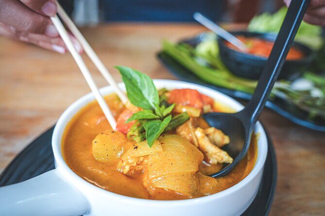 Discover the Tastes Temples and Tales of Authentic Cambodia - Sisowath riverside park: private boat time and a happy-hour feel