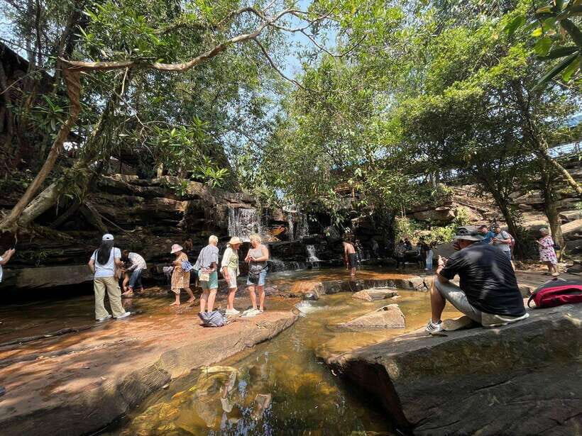 Exploring Sihanoukville: Shore Excursions from Cruise Ports - Kbal Chhay Waterfall time: a cool dip with real-world footing