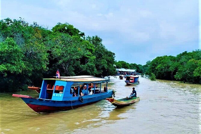 Floating Village-Mangrove Forest Private Tonle Sap Lake Boat Tour - Ro Lous Market: quick steps into old Angkor-era life