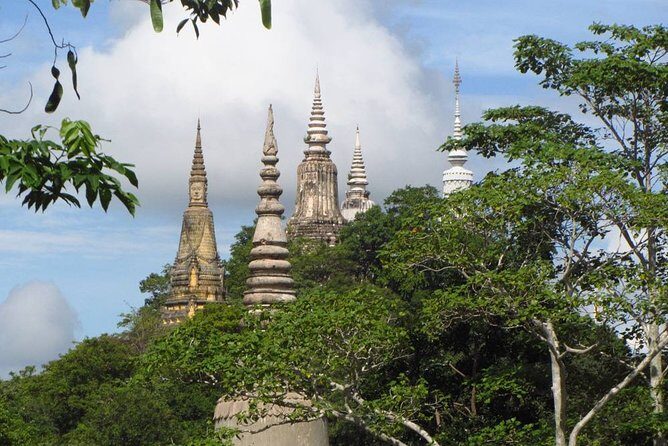 Full-Day Discover Oudong Mountain-Former Capital City & Phnom Penh City Tours - Oudong Mountain: stupa details and the view from Phnom Udong