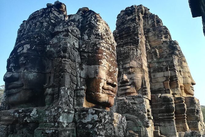 Half Day Angkor Wat Sunrise Private Tour - Bayon Temple: Smiling Faces as a Calm Finale