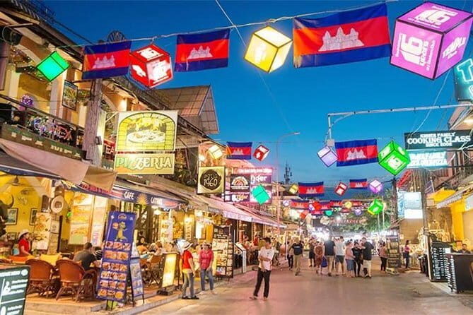 Night Street Tour in Siem Reap - Stop 1: Angkor Wat sunset drinks, canapés, and the pass question