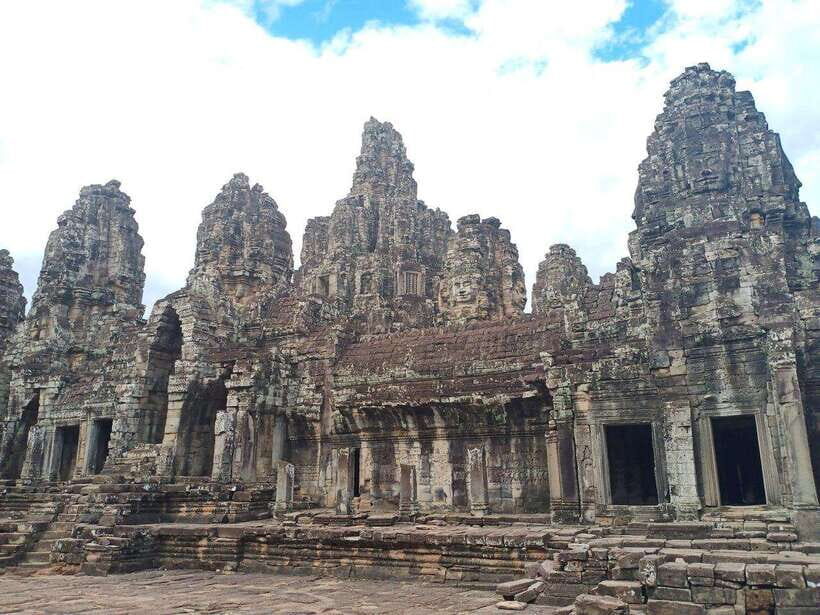 One Day Angkor Wat Trip with Sunrise - Baphuon and Phimeanakas: the stairs, the Buddha, and the jungle view