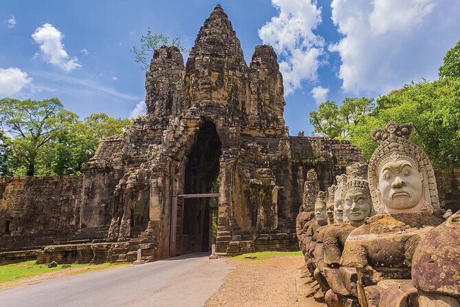 One Day Private Guide Tour of Angkor Thom, Bayon, Ta Phrom & Angkor Wat - Angkor Thom South Gate: the story kicks off fast