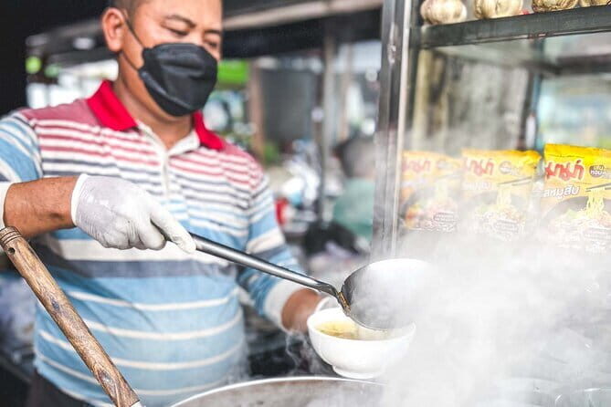 Phnom Penh Night City Highlights & Local Food tour by Tuktuk - Stop 6: Bassac Lane—beer at the end, not before the hard stuff