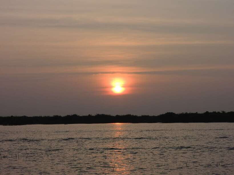 Phnom Penh to Siem Reap cruise/road tour (one way) - The day plan: hotel pickup, ~4.5 hours of cruising, then road to Siem Reap