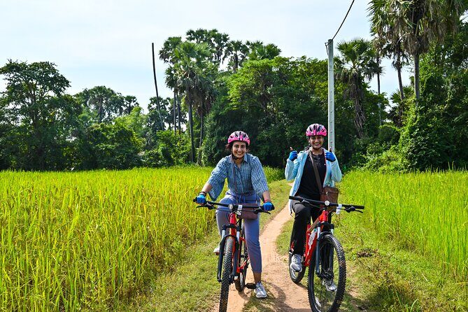 Private Angkor Sunrise Bike Tour Supported By Minivan - Bayon Temple and Angkor Thom: Four Faces, Busy Lessons