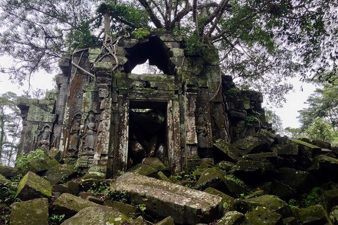 Private Full-Day Tour to Koh Ker and Beng Mealea - Beng Mealea From the West Gate: Jungle Path to Overgrown Towers