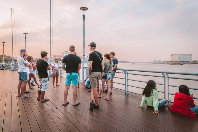 Riverside Walking Tour with Snack, Drinks & Local Ferry Ride - Stop 1: Royal Palace sunset views and a local ferry ride