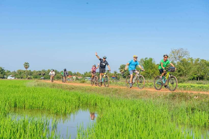 Siem Reap: Angkor Sunrise 2 Days Guided Bike Tour - Rice Wine Distillation Stops and Handicraft Time