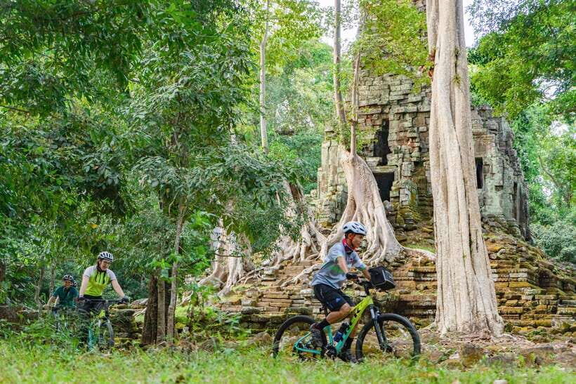 Siem Reap: Angkor Sunset Bike & Boat Tour /E-Bike Available - The bike route: river crossing, trails behind Angkor, and single-track calm