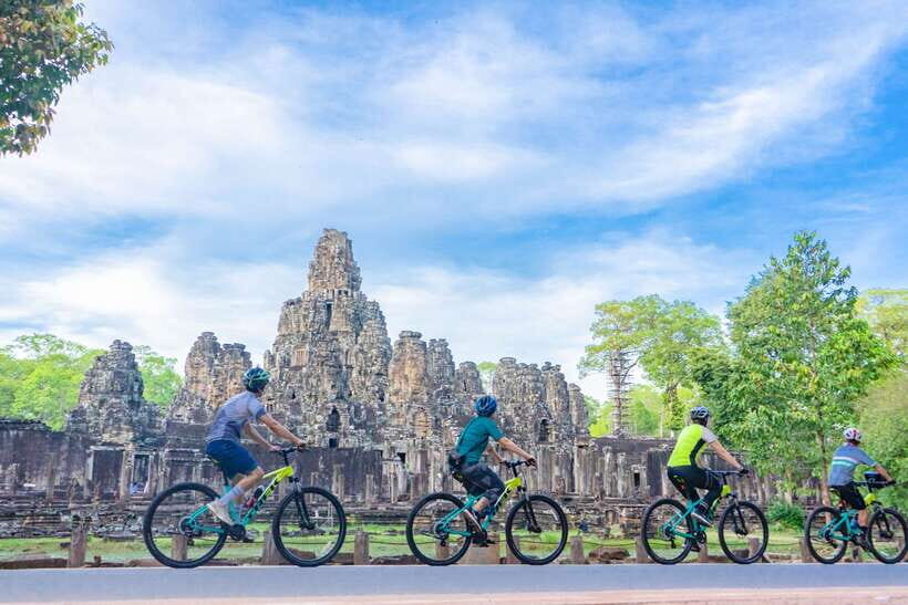 Siem Reap: Angkor Sunset Bike & Boat Tour /E-Bike Available - Bikes, pace, and who should pick this tour