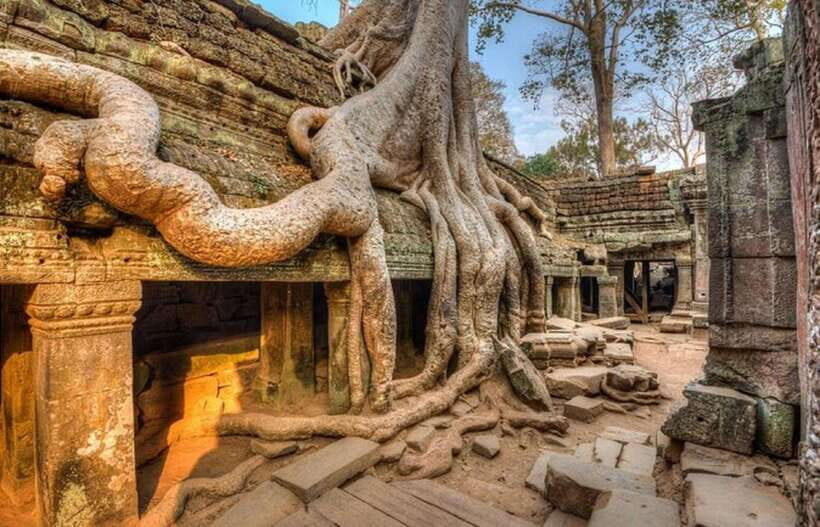 Siem Reap: Angkor Wat Small-group Sunrise or Sunset Tour - Bayon Temple in Angkor Thom: The Faces That Follow You