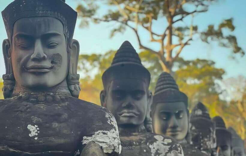 Siem Reap: Angkor Wat Sunrise Small-Group Guided Day Tour - Tonle Om Gate and Bayon: from grand entry to smiling faces