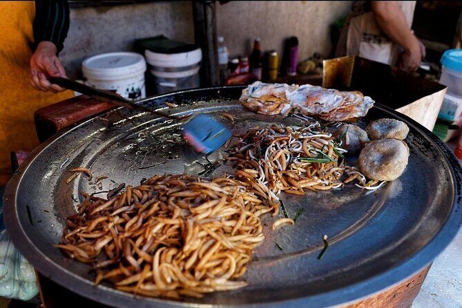 Siem Reap Authentic Breakfast and Market Tour - Stop 4: Phsar Leu Thom Thmey dessert market and pick-your-sweets photos