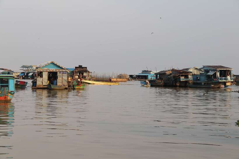 Siem Reap: Floating Village Tour - Into the rivers: flat-bottom boats and a time-forgotten world