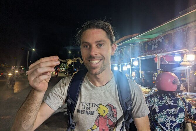 Siem Reap Nocturnal Excursion & Apsara Dance Show - Angkor Kyung Yu street market: snacks, fruit, and how locals shop at night