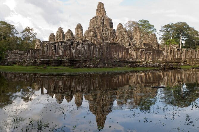 Siem Reap Sunrise Private Tour - Ta Prohm’s roots and stone: where the jungle becomes part of the view