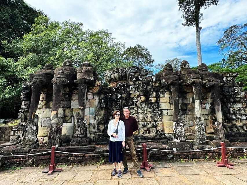 Siem Reap Temple Tour with Visit to Angkor Wat & Breakfast - Ta Prohm and Pre Rup: jungle trees, huge roots, and open-air views