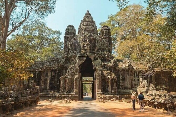 Two Day Tour, Taxi Phnom Penh to Siem Reap, Angkor Visit & Return - Angkor Thom South Gate, Bayon, Ta Prohm, and More: A Day with Real Variety